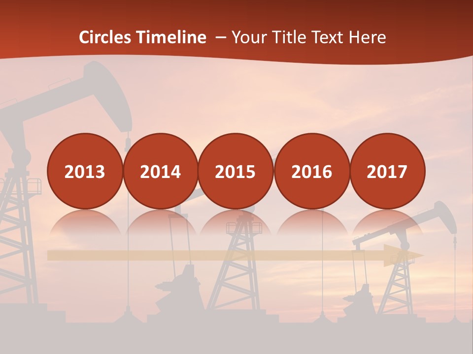 A Group Of Oil Pumps With A Sunset In The Background PowerPoint Template