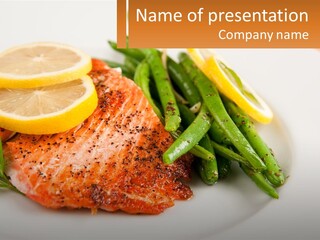 A Plate Of Salmon, Green Beans And Lemon Slices PowerPoint Template