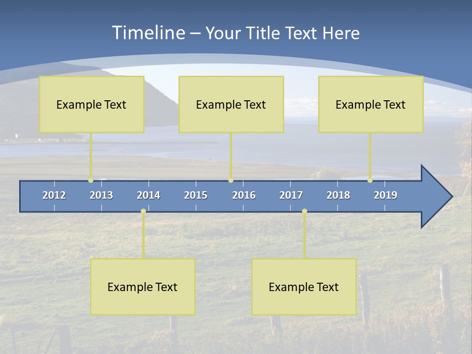 A Green Field With A Lake In The Background PowerPoint Template