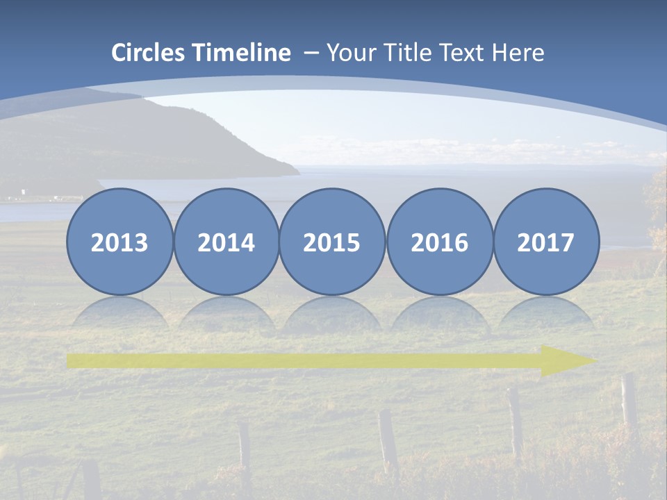 A Green Field With A Lake In The Background PowerPoint Template