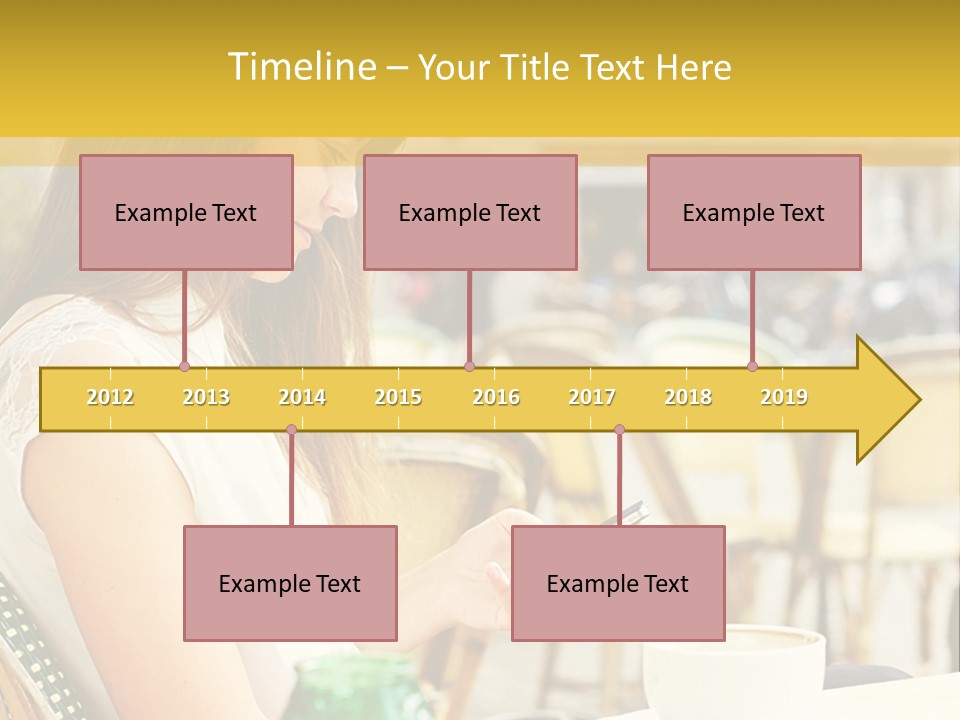 A Woman Sitting At A Table Using A Cell Phone PowerPoint Template