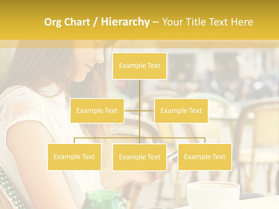 A Woman Sitting At A Table Using A Cell Phone PowerPoint Template