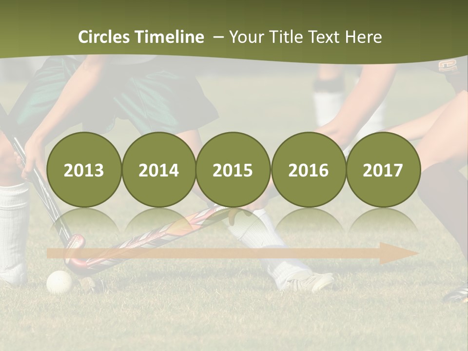A Group Of People Playing A Game Of Field Hockey PowerPoint Template
