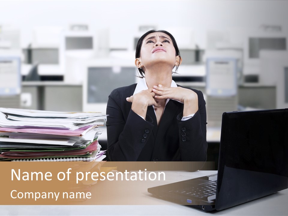 A Woman Sitting In Front Of A Laptop Computer PowerPoint Template