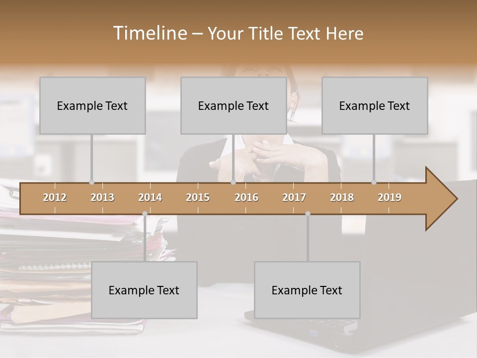 A Woman Sitting In Front Of A Laptop Computer PowerPoint Template