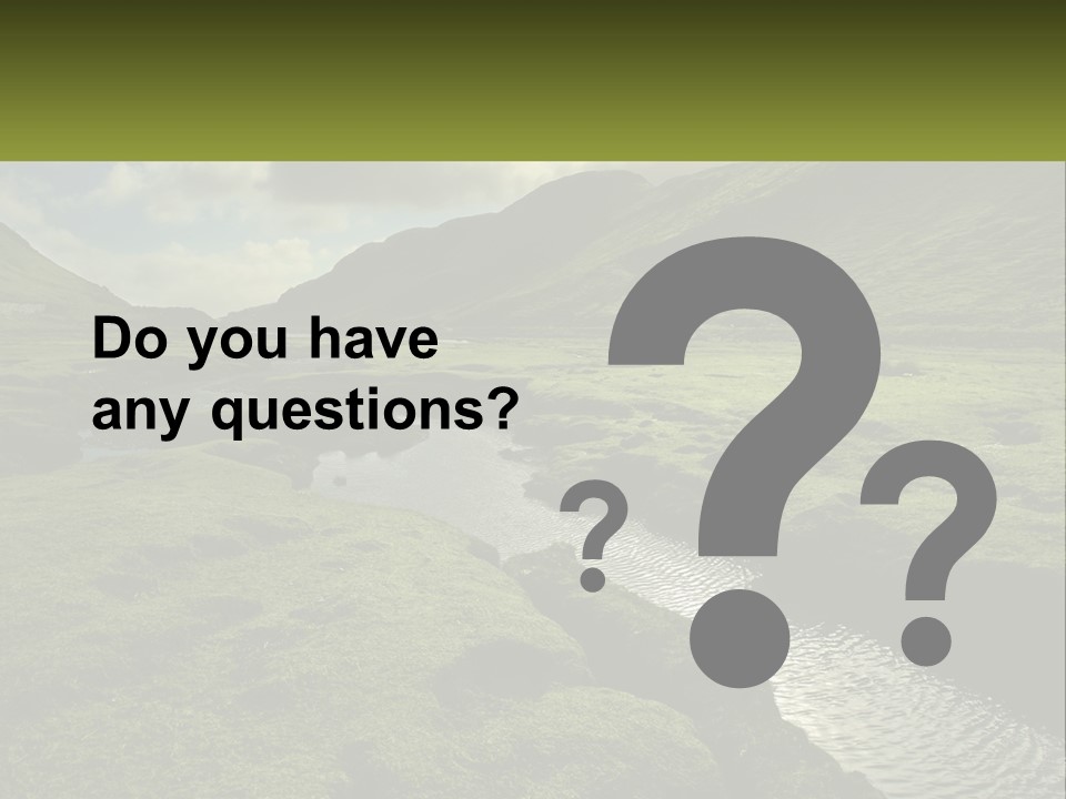 A River Running Through A Lush Green Valley PowerPoint Template