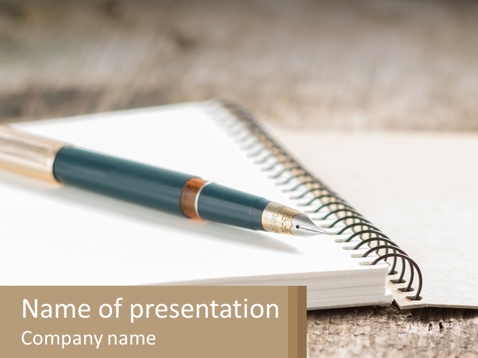 A Notebook With A Pen On Top Of It PowerPoint Template