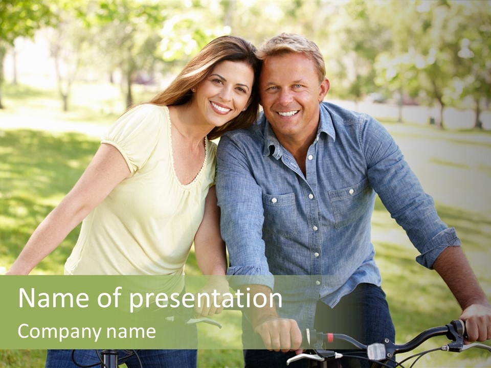 A Man And A Woman On A Bike In A Park PowerPoint Template