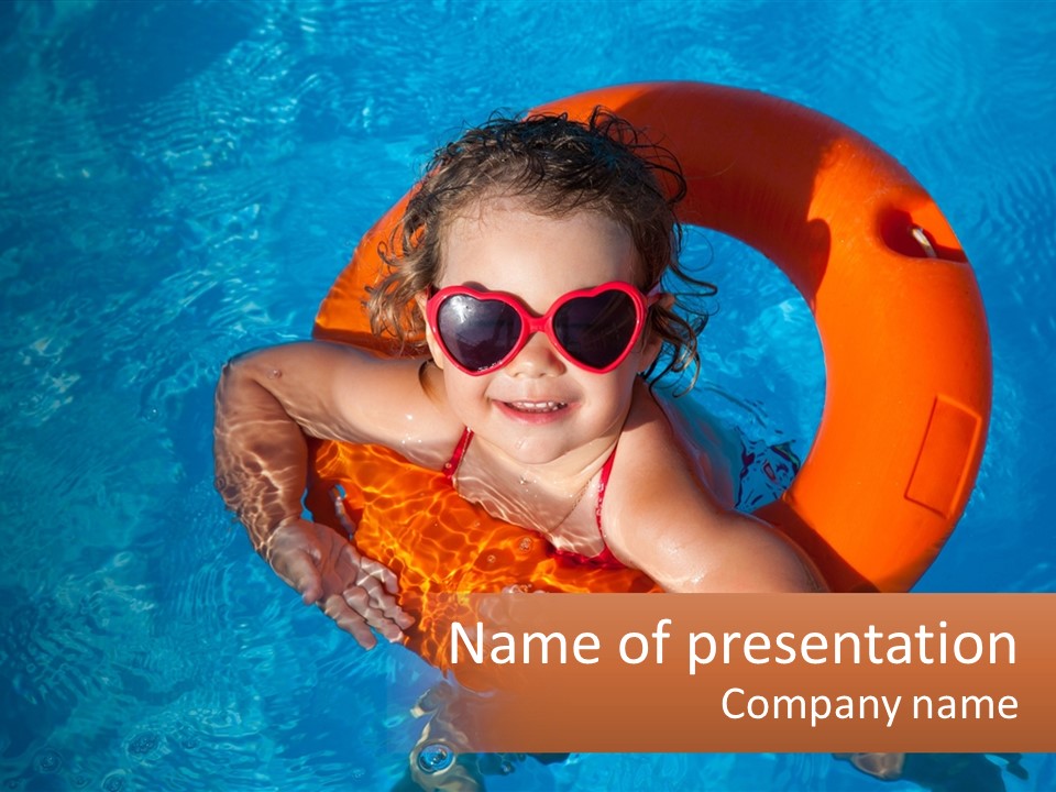 A Little Girl In A Pool With A Life Preserver PowerPoint Template