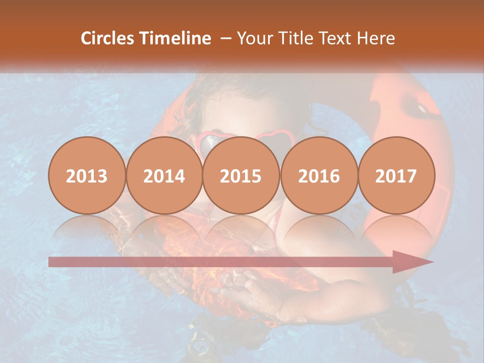 A Little Girl In A Pool With A Life Preserver PowerPoint Template