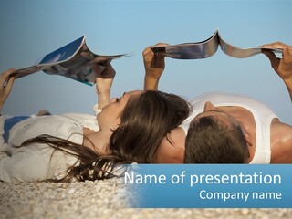 A Man And Woman Laying On The Beach Reading Books PowerPoint Template