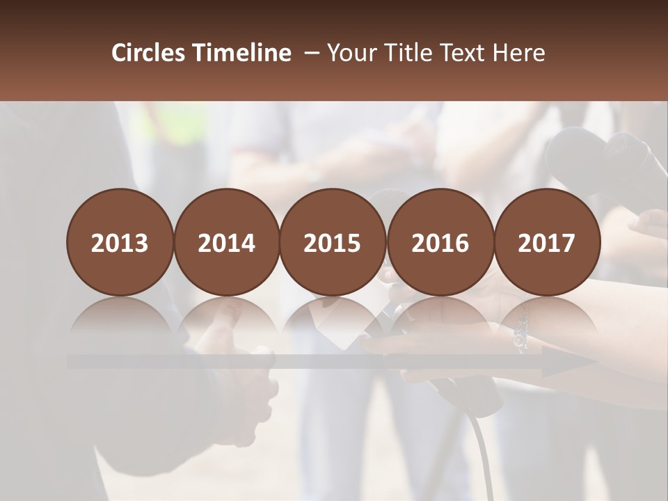 A Person Holding A Microphone In Front Of Microphones PowerPoint Template