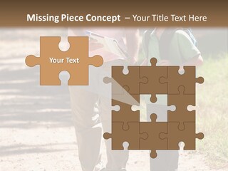 A Man And A Boy Walking Down A Dirt Road PowerPoint Template