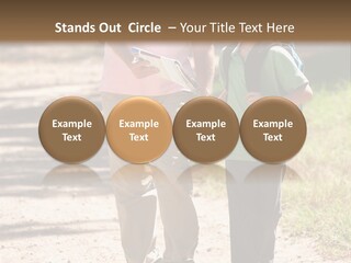 A Man And A Boy Walking Down A Dirt Road PowerPoint Template