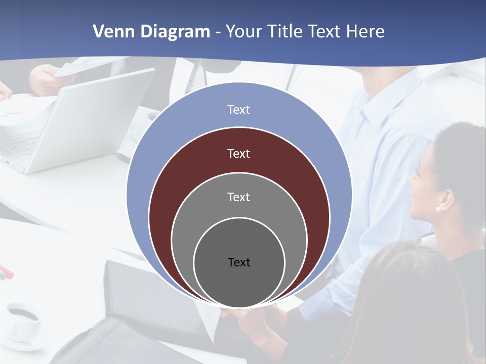 A Group Of People Sitting Around A Table With Laptops PowerPoint Template