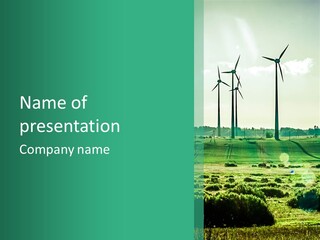 A Green Field With Windmills In The Background PowerPoint Template