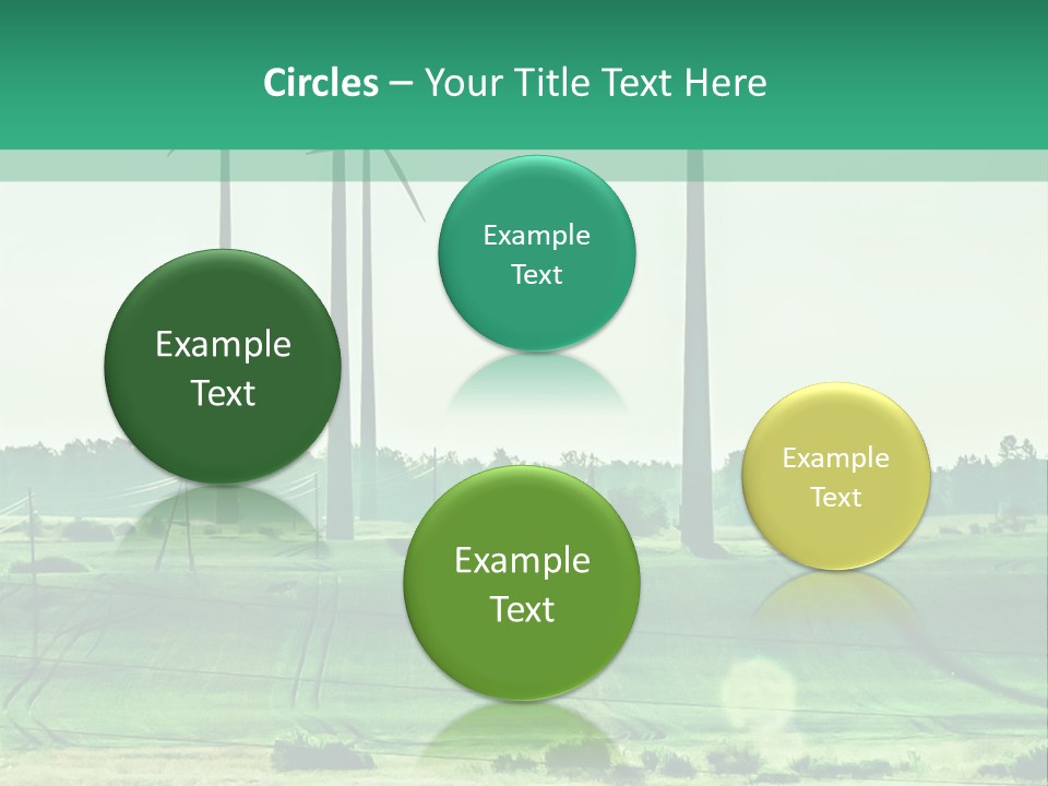 A Green Field With Windmills In The Background PowerPoint Template