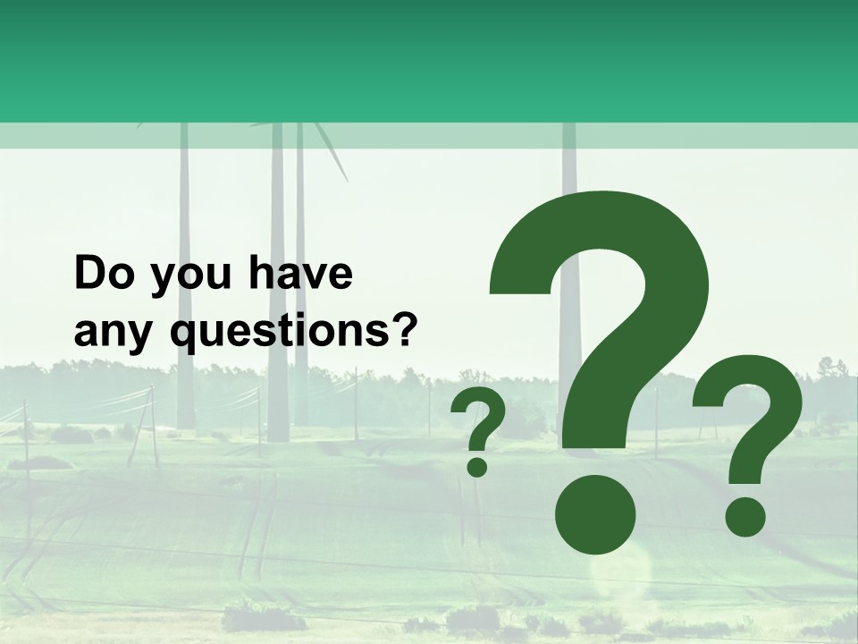 A Green Field With Windmills In The Background PowerPoint Template