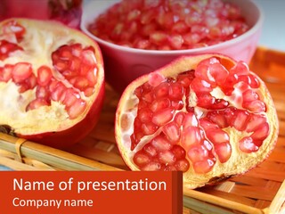 A Pomegranate On A Bamboo Tray With A Bowl Of Pomegra PowerPoint Template