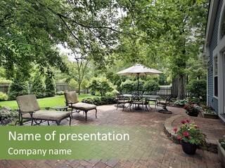 A Brick Patio With Chairs And An Umbrella PowerPoint Template