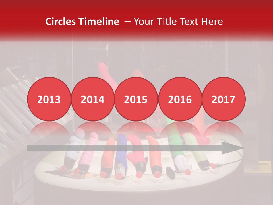 A Display Case Filled With Lots Of Different Colored Items PowerPoint Template