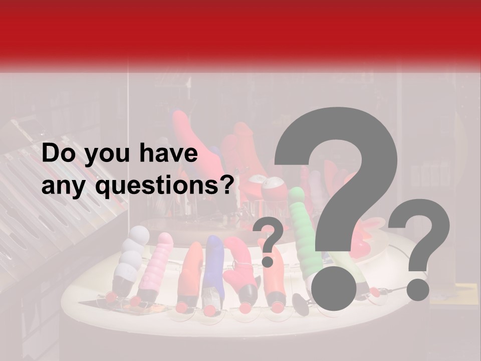 A Display Case Filled With Lots Of Different Colored Items PowerPoint Template