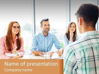 A Group Of People Sitting Around A Table PowerPoint Template