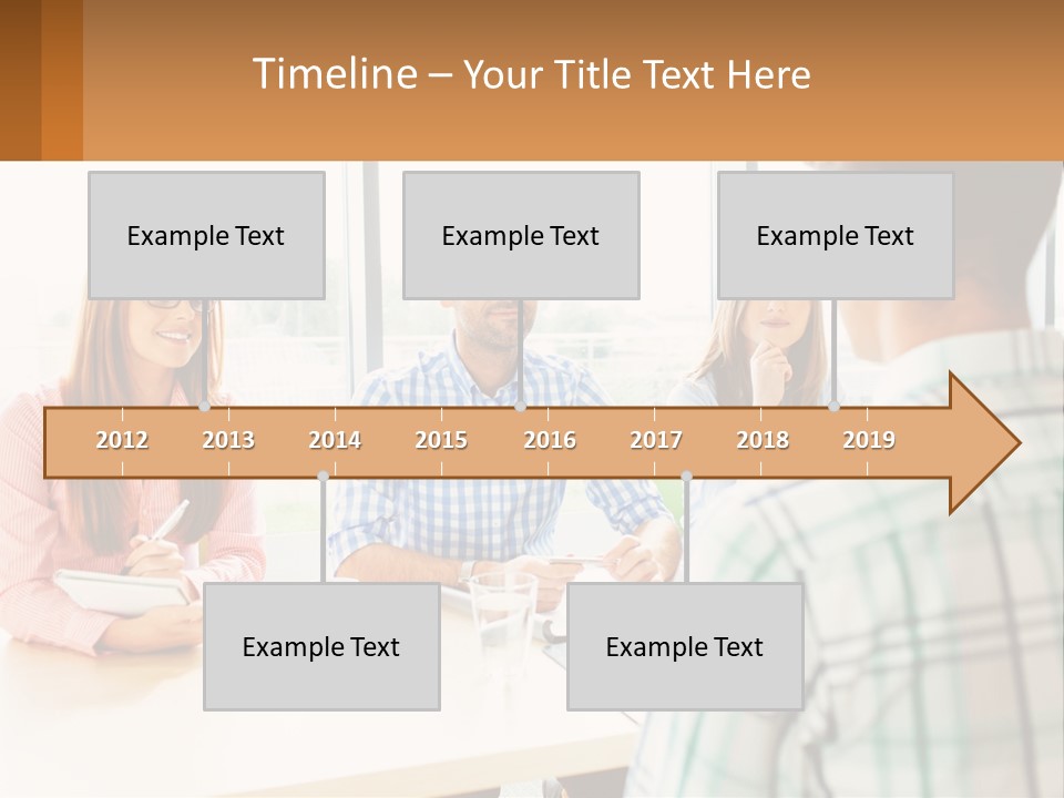 A Group Of People Sitting Around A Table PowerPoint Template