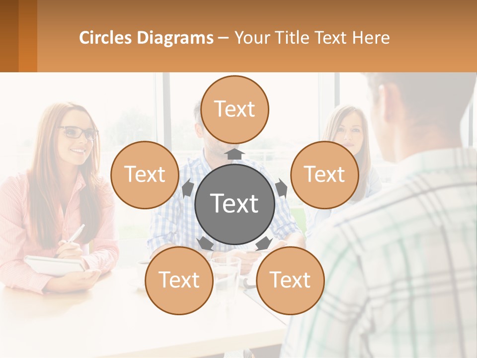 A Group Of People Sitting Around A Table PowerPoint Template