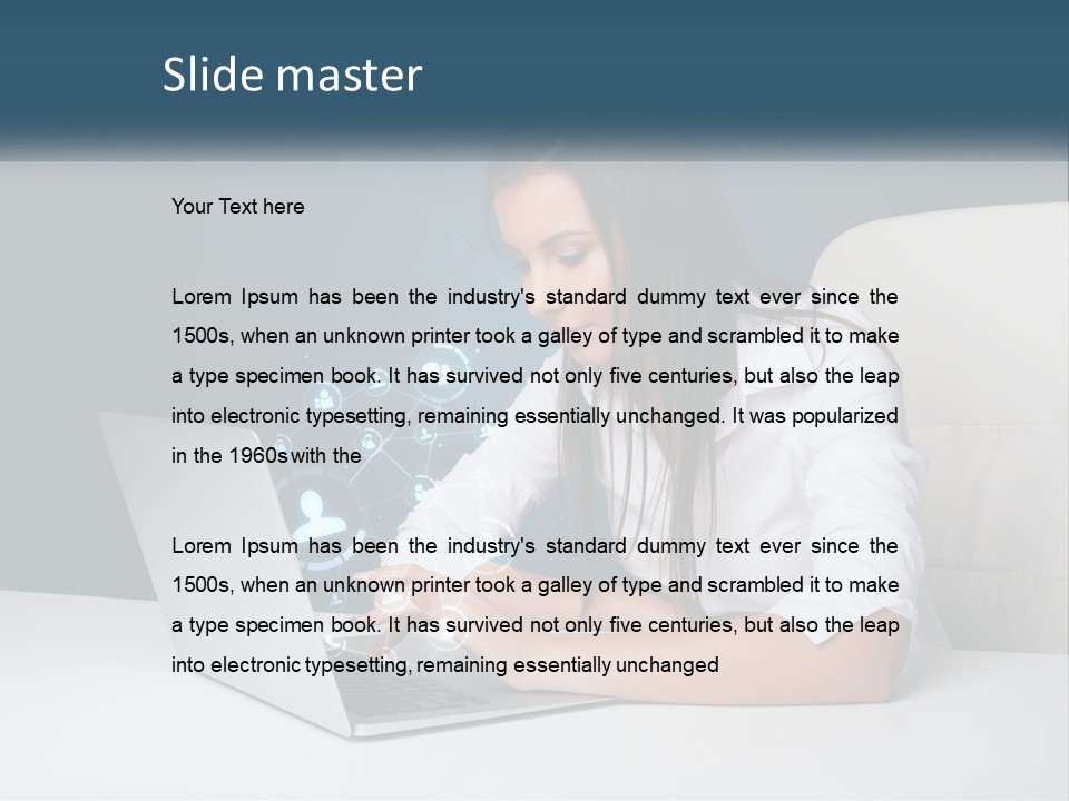A Woman Sitting At A Desk Using A Laptop Computer PowerPoint Template