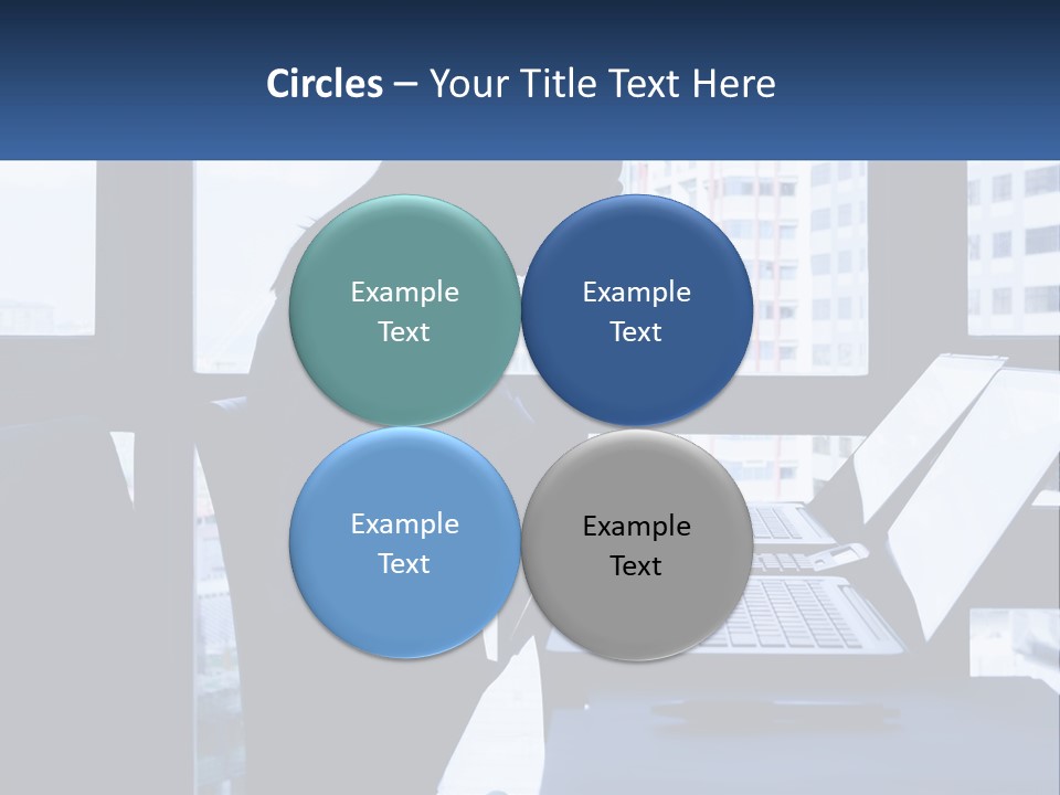 A Man Sitting In Front Of A Laptop Computer PowerPoint Template