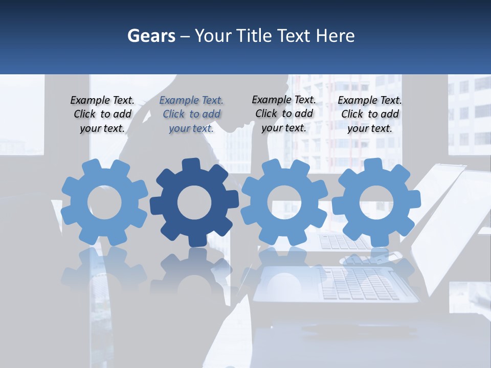 A Man Sitting In Front Of A Laptop Computer PowerPoint Template