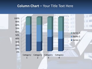 A Man Sitting In Front Of A Laptop Computer PowerPoint Template