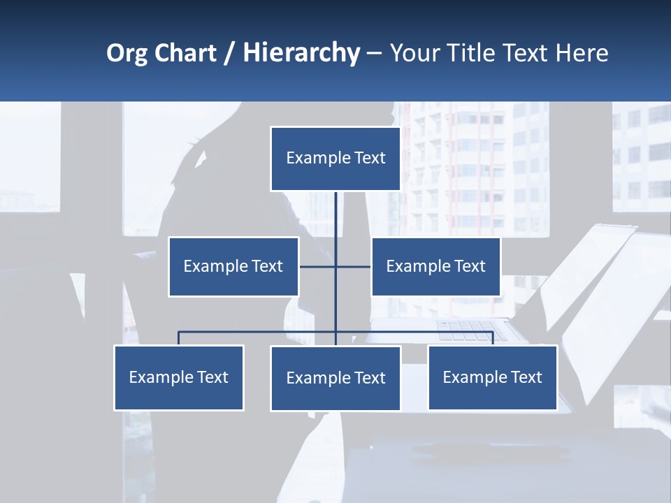 A Man Sitting In Front Of A Laptop Computer PowerPoint Template