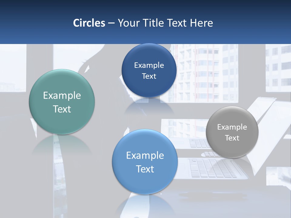 A Man Sitting In Front Of A Laptop Computer PowerPoint Template