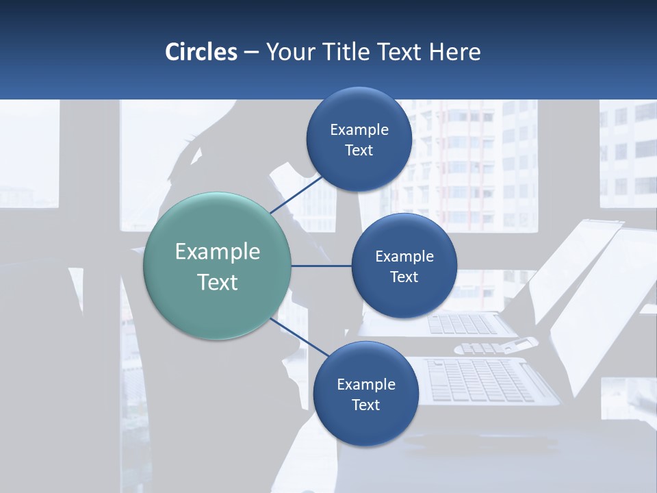 A Man Sitting In Front Of A Laptop Computer PowerPoint Template