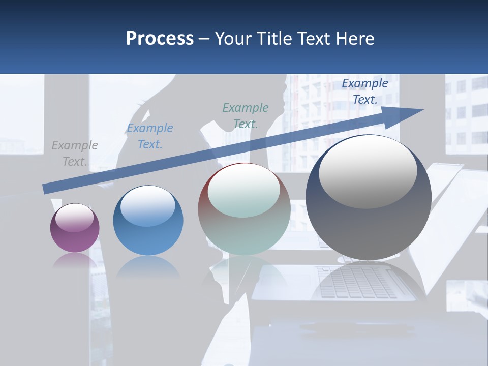 A Man Sitting In Front Of A Laptop Computer PowerPoint Template