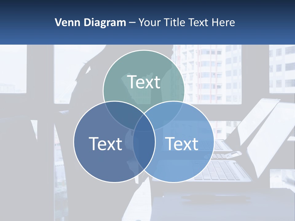 A Man Sitting In Front Of A Laptop Computer PowerPoint Template