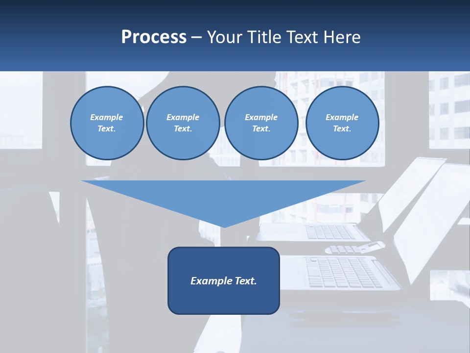A Man Sitting In Front Of A Laptop Computer PowerPoint Template