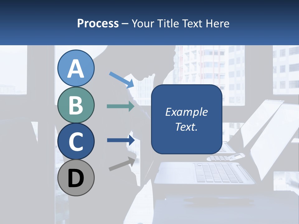 A Man Sitting In Front Of A Laptop Computer PowerPoint Template
