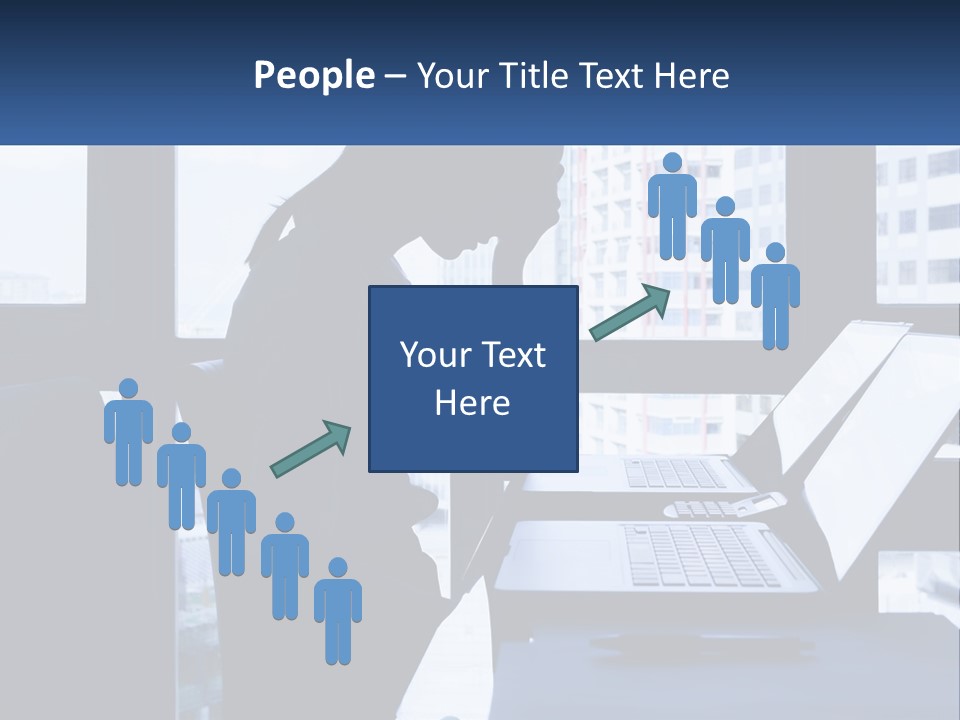 A Man Sitting In Front Of A Laptop Computer PowerPoint Template