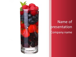 A Glass Filled With Berries And Blueberries On Top Of A Table PowerPoint Template