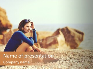 A Woman Sitting On The Beach With Her Feet Up PowerPoint Template