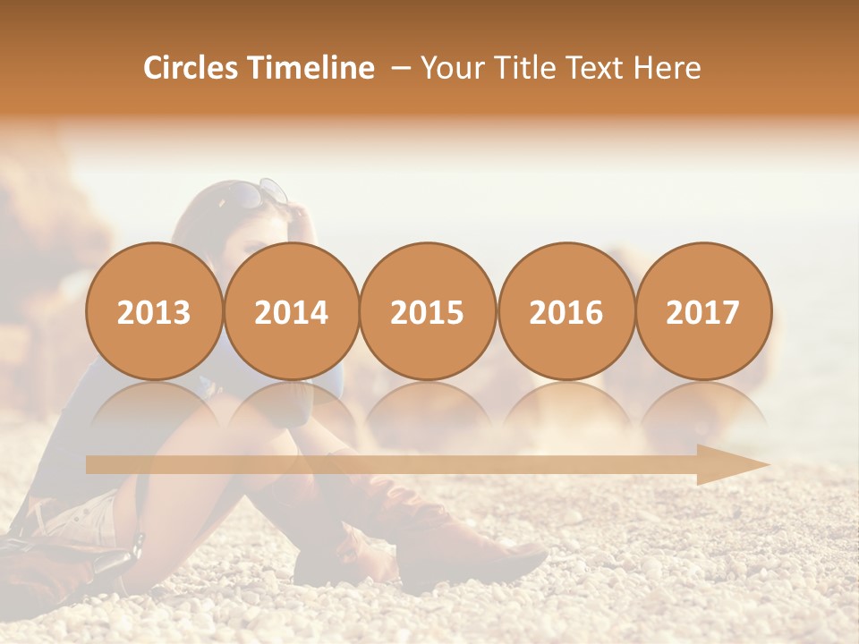 A Woman Sitting On The Beach With Her Feet Up PowerPoint Template