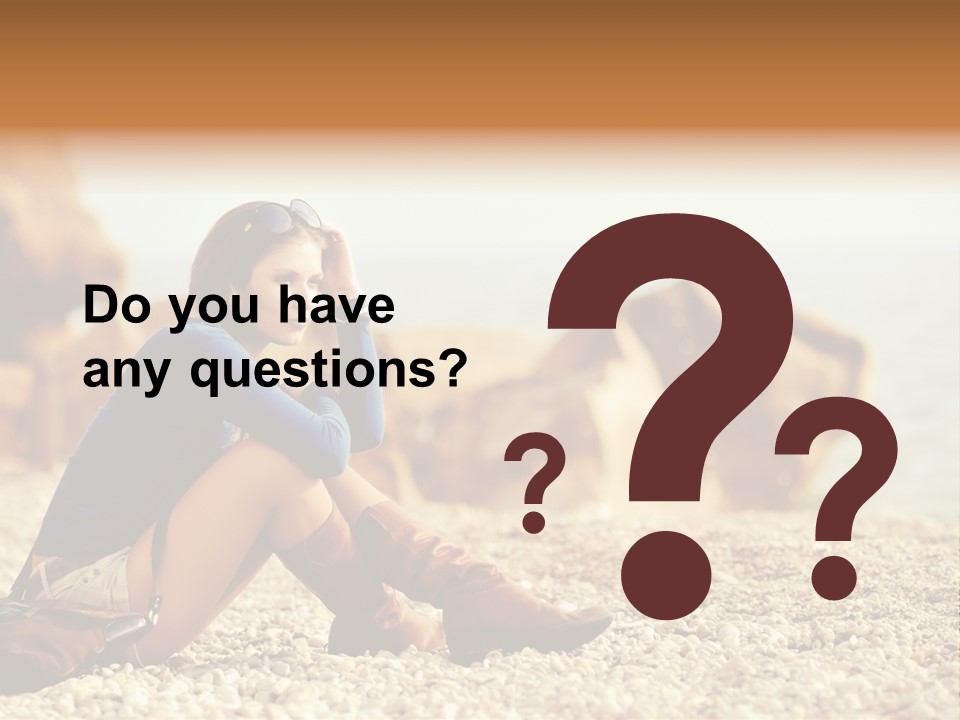 A Woman Sitting On The Beach With Her Feet Up PowerPoint Template