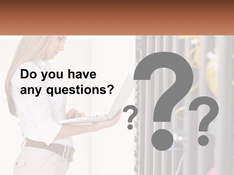 A Woman Is Holding A Laptop In Front Of A Server PowerPoint Template