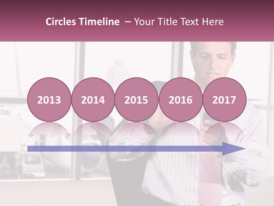 A Man Is Holding A Pink Tie And Looking At His Cell Phone PowerPoint Template