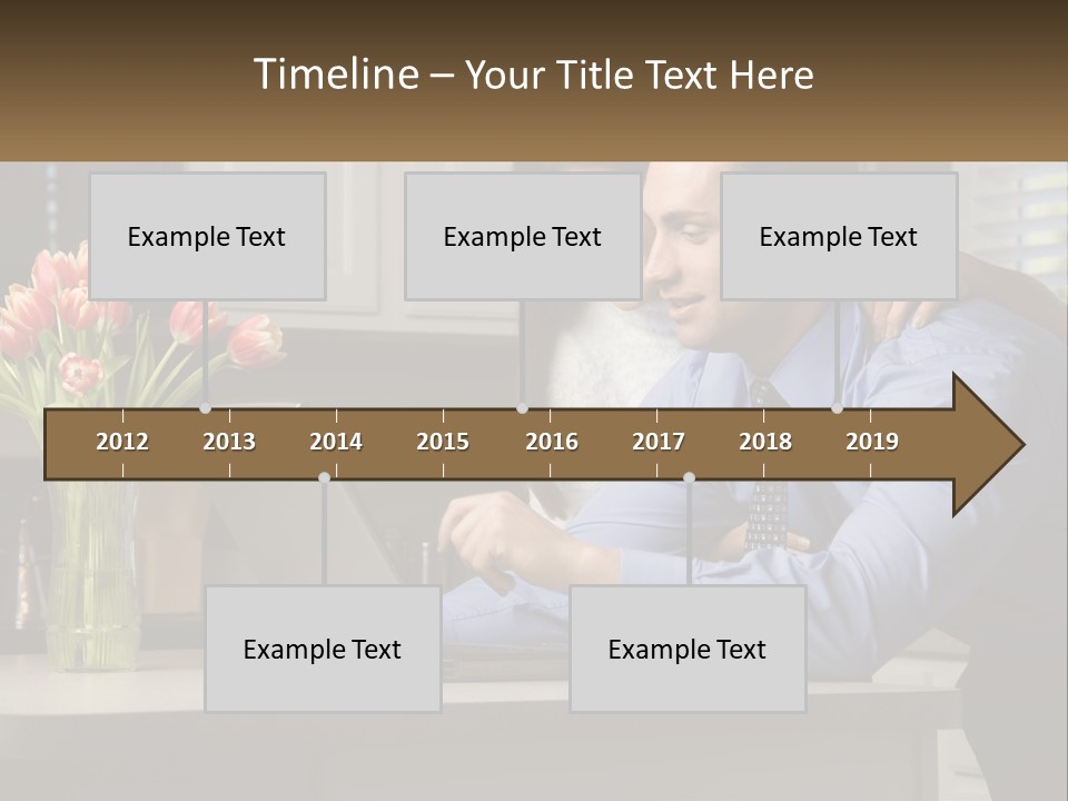 A Man And Woman Looking At A Laptop Computer PowerPoint Template