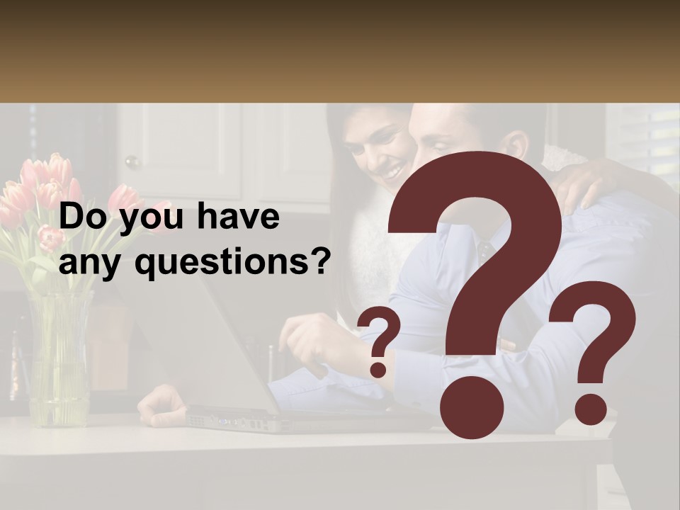 A Man And Woman Looking At A Laptop Computer PowerPoint Template