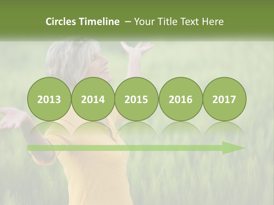 A Woman Standing In A Field Of Green Grass PowerPoint Template